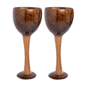 shell & soul handmade coconut shell wine glass (200–250 ml) | eco friendly natural drinkware | sustainable, food safe, chemical free | premium artisan wine goblet about this item 🌿 handcrafted from natural coconut shell
each wine glass is carefully handmade from real coconut shells, giving every piece a unique texture, grain, and natural finish. 🍷 elegant & functional design
ergonomic goblet shape with a sturdy wooden stem—perfect for wine, cocktails, mocktails, juices, or festive drinks. ♻️ eco friendly & sustainable choice
made using upcycled coconut shells, this glass is biodegradable, plastic free, and supports conscious living. 🛡️ food safe & chemical free
naturally polished and sealed using food safe methods—free from harmful chemicals, plastics, or synthetic coatings. 🎁 premium gifting & home décor
a beautiful choice for housewarming gifts, weddings, festive occasions, or eco luxury dining collections. 🧼 easy care & long lasting use simple to maintain—hand wash gently with mild soap and warm water, then towel dry. avoid dishwashers, microwaves, and ovens. with proper care, these durable coconut shell wine glasses will last for years while retaining their natural beauty and shine